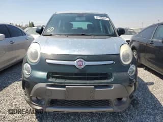 ✅ 2014 FIAT 500L Trekking • VIN: ZFBCFADH4EZ010196 • Lot: 62566094. Listed on Copart with 128,519 mi. Free auction sales archive from the USA and detailed vehicle history report at DreamBid. Image 5.
