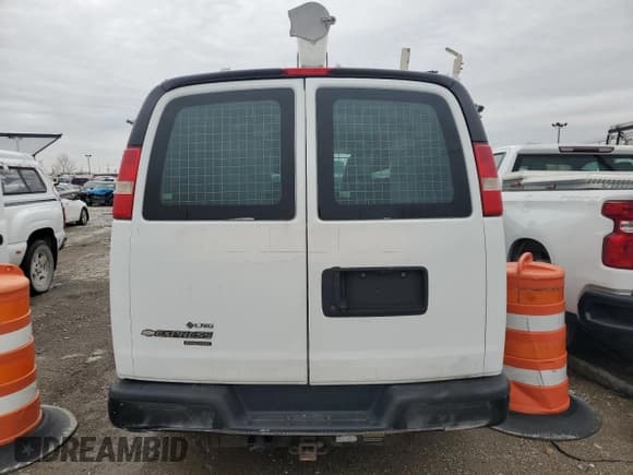 ✅ 2013 Chevrolet Express Cargo • VIN: 1GCWGFCB1D1902131 • Lot: 66237105. Listed on Copart with 75,185 mi. Free auction sales archive from the USA and detailed vehicle history report at DreamBid. Image 6.