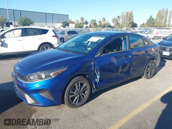 ✅ 2022 Kia Forte LXS • VIN: 3KPF24AD9NE464903 • Лот: 43549379. Опубликован ранее на IAAI с пробегом 36 400 миль. Бесплатный доступ к архиву аукционных продаж из США и подробный отчёт об истории автомобиля на DreamBid. Изображение 2.