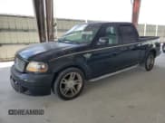 ✅ 2003 Ford F-150 Harley-Davidson • VIN: 1FTRW07343KD83293 • Lot: 55600275. Listed on Copart with 176,233 mi. Free auction sales archive from the USA and detailed vehicle history report at DreamBid. Image 1.