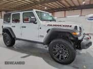 ✅ 2023 Jeep Wrangler Rubicon • VIN: 1C4HJXFG7PW560702 • Lot: 95872145. Wystawiony na Copart z przebiegiem 33 860 mil. Bezpłatny archiwum sprzedaży aukcyjnych z USA i szczegółowy raport historii pojazdu na DreamBid. Zdjęcie 4.