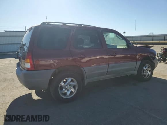 ✅ 2003 Mazda Tribute DX • VIN: 4F2YZ02B63KM48906 • Лот: 88167215. Опубликован ранее на Copart с пробегом 153 526 миль. Бесплатный доступ к архиву аукционных продаж из США и подробный отчёт об истории автомобиля на DreamBid. Изображение 3.