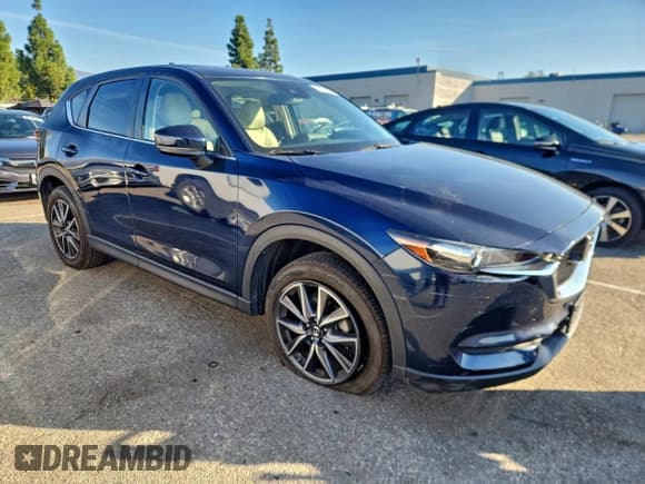 ✅ 2018 Mazda CX-5 Touring • VIN: JM3KFACM1J1422325 • Lot: 94100955. Wystawiony na Copart z przebiegiem 44 578 mil. Bezpłatny archiwum sprzedaży aukcyjnych z USA i szczegółowy raport historii pojazdu na DreamBid. Zdjęcie 4.