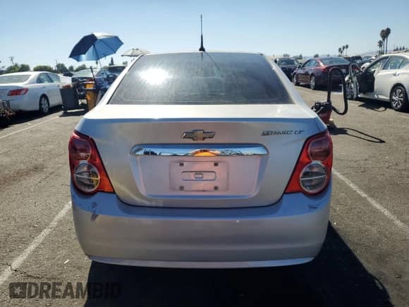 2014 Chevrolet Sonic LT с VIN 1G1JC5SH6E4203334, выставлен на аукционе Copart как лот 68343264 с пробегом 131 613 миль миль и Списание • Salvage title. История ставок и продаж доступна на DreamBid. Изображение 6.