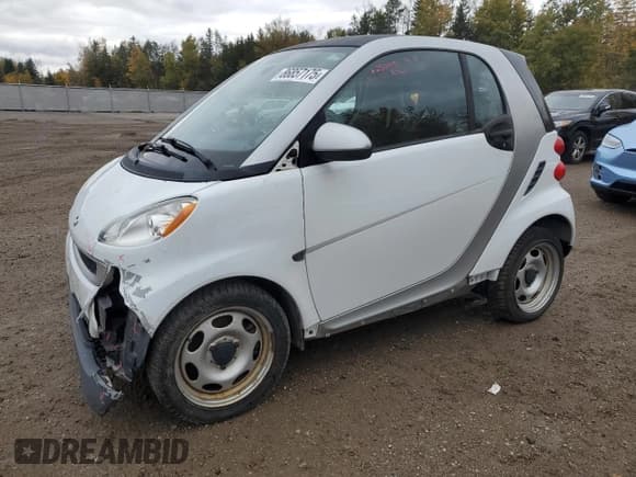 ✅ 2012 Smart fortwo Pure • VIN: WMEEJ3BA5CK573299 • Lot: 86857175. Listed on Copart with 71,721 mi. Free auction sales archive from the USA and detailed vehicle history report at DreamBid. Image 1.