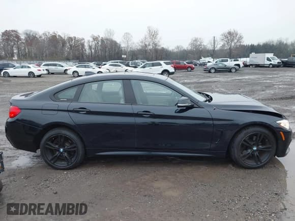 ✅ 2015 BMW 4 Series 428i xDrive • VIN: WBA4C9C56FD330535 • Lot: 43742856. Wystawiony na IAAI z przebiegiem 157 456 mil. Bezpłatny archiwum sprzedaży aukcyjnych z USA i szczegółowy raport historii pojazdu na DreamBid. Zdjęcie 13.