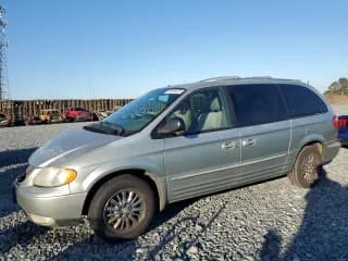 ✅ 2003 Chrysler Town & Country Limited • VIN: 2C8GP64L73R158488 • Lot: 87424475. Listed on Copart with 165,774 mi. Free auction sales archive from the USA and detailed vehicle history report at DreamBid. Image 1.