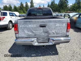 ✅ 2002 Dodge Dakota SLT • VIN: 1B7HG48N02S548464 • Lot: 58943135. Wystawiony na Copart z przebiegiem 239 081 mil. Bezpłatny archiwum sprzedaży aukcyjnych z USA i szczegółowy raport historii pojazdu na DreamBid. Zdjęcie 6.