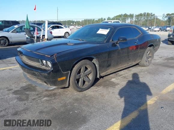 ✅ 2014 Dodge Challenger SXT • VIN: 2C3CDYAG7EH304459 • Lot: 43682366. Listed on IAAI with 197,016 mi. Free auction sales archive from the USA and detailed vehicle history report at DreamBid. Image 17.