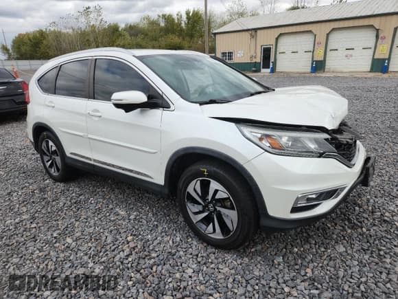 ✅ 2016 Honda CR-V Touring • VIN: 5J6RM4H91GL101783 • Lot: 82657945. Wystawiony na Copart z przebiegiem 98 451 mil. Bezpłatny archiwum sprzedaży aukcyjnych z USA i szczegółowy raport historii pojazdu na DreamBid. Zdjęcie 4.