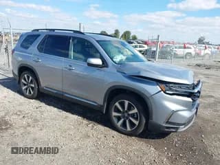 ✅ 2024 Honda Pilot Touring • VIN: 5FNYG1H71RB041323 • Lot: 43554541. Listed on IAAI with 19,738 mi. Free auction sales archive from the USA and detailed vehicle history report at DreamBid. Image 1.