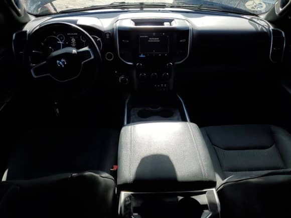 2023 Ram 1500 Lone Star with VIN 1C6RREMT8PN565793, listed as a Copart auction lot 77084184 with 18,825 mi miles and Salvage title. Bid and sale history available at DreamBid. Image 8.