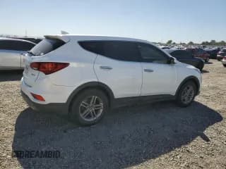 ✅ 2017 Hyundai Santa Fe 2.4L • VIN: 5NMZT3LB3HH034720 • Лот: 57000355. Опубликован ранее на Copart с пробегом 146 315 миль. Бесплатный доступ к архиву аукционных продаж из США и подробный отчёт об истории автомобиля на DreamBid. Изображение 3.