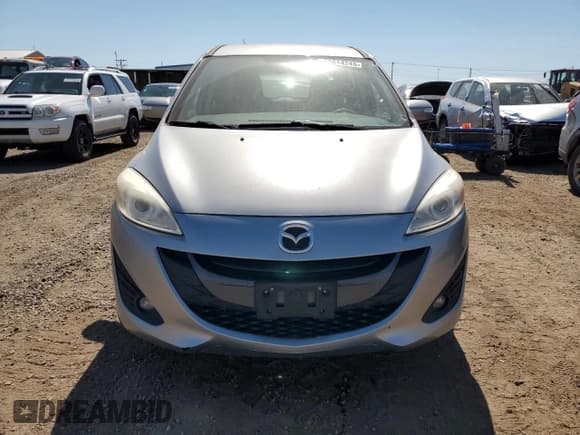 ✅ 2015 Mazda 5 Touring • VIN: JM1CW2CL3F0188292 • Лот: 63814245. Опубликован ранее на Copart с пробегом 93 080 миль. Бесплатный доступ к архиву аукционных продаж из США и подробный отчёт об истории автомобиля на DreamBid. Изображение 5.