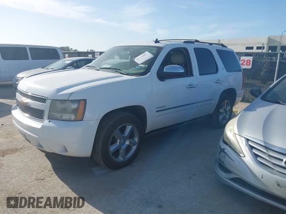 ✅ 2011 Chevrolet Tahoe LTZ • VIN: 1GNSCCE03BR397672 • Lot: 42775981. Listed on IAAI with 210,316 mi. Free auction sales archive from the USA and detailed vehicle history report at DreamBid. Image 2.