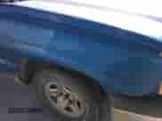 2004 Chevrolet Silverado 1500 z VIN 1GCEC14X84Z183580, wystawiony jako IAAI lot #42570004 z przebiegiem 57 116 mil mil oraz . Historia ofert i sprzedaży dostępna na DreamBid. Obrazek 1.