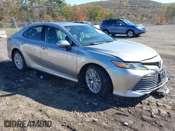 ✅ 2020 Toyota Camry Hybrid XLE • VIN: 4T1F31AKXLU542108 • Lot: 43499731. Listed on IAAI with 122,900 mi. Free auction sales archive from the USA and detailed vehicle history report at DreamBid. Image 1.