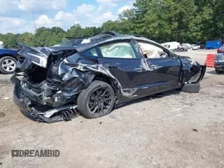 ✅ 2024 Tesla Model 3 • VIN: 5YJ3E1EA9RF856210 • Lot: 43217019. Listed on IAAI with 95,766 mi. Free auction sales archive from the USA and detailed vehicle history report at DreamBid. Image 4.