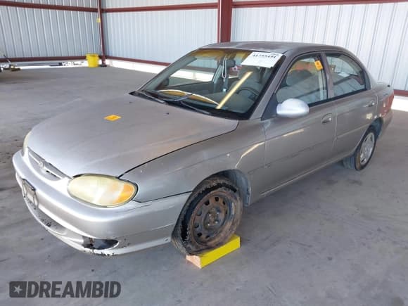 ✅ 2000 Kia Sephia • VIN: KNAFB121XY5905566 • Лот: 41755491. Опубликован ранее на IAAI с пробегом Не указан. Бесплатный доступ к архиву аукционных продаж из США и подробный отчёт об истории автомобиля на DreamBid. Изображение 2.