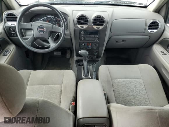 ✅ 2005 GMC Envoy SLE • VIN: 1GKDS13S752189079 • Лот: 71419365. Опубликован ранее на Copart с пробегом 122 219 миль. Бесплатный доступ к архиву аукционных продаж из США и подробный отчёт об истории автомобиля на DreamBid. Изображение 8.