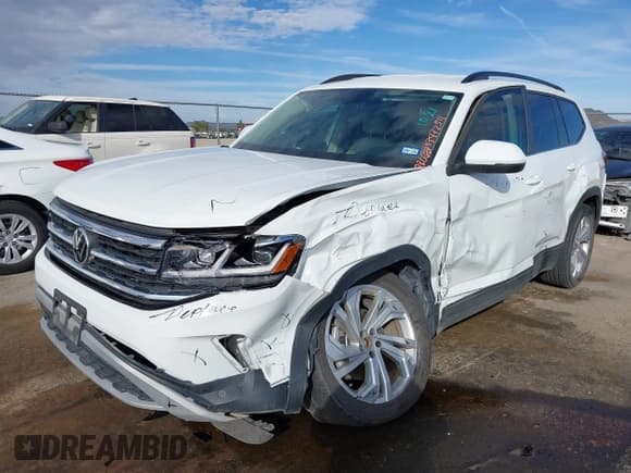 ✅ 2022 Volkswagen Atlas SE • VIN: 1V2WR2CA4NC557725 • Lot: 43472311. Wystawiony na IAAI z przebiegiem 23 725 mil. Bezpłatny archiwum sprzedaży aukcyjnych z USA i szczegółowy raport historii pojazdu na DreamBid. Zdjęcie 6.