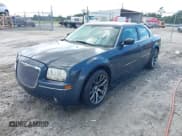 ✅ 2007 Chrysler 300 • VIN: 2C3KA43R97H639172 • Lot: 42867622. Listed on IAAI with 165,255 mi. Free auction sales archive from the USA and detailed vehicle history report at DreamBid. Image 2.