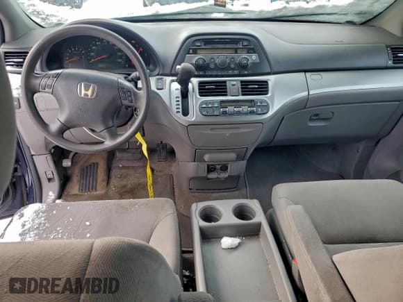 ✅ 2008 Honda Odyssey EX • VIN: 5FNRL38488B096304 • Лот: 94923815. Опубликован ранее на Copart с пробегом 157 176 миль. Бесплатный доступ к архиву аукционных продаж из США и подробный отчёт об истории автомобиля на DreamBid. Изображение 8.