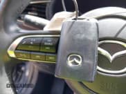 ✅ 2024 Mazda CX-30 S Carbon Edition • VIN: 3MVDMBCM4RM651155 • Lot: 42529864. Wystawiony na IAAI z przebiegiem 36 557 mil. Bezpłatny archiwum sprzedaży aukcyjnych z USA i szczegółowy raport historii pojazdu na DreamBid. Zdjęcie 11.