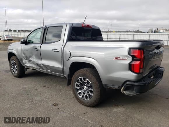 ✅ 2024 Chevrolet Colorado 4WD Z71 • VIN: 1GCPTDEK0R1296409 • Лот: 84957595. Опубликован ранее на Copart с пробегом 10 446 миль. Бесплатный доступ к архиву аукционных продаж из США и подробный отчёт об истории автомобиля на DreamBid. Изображение 2.