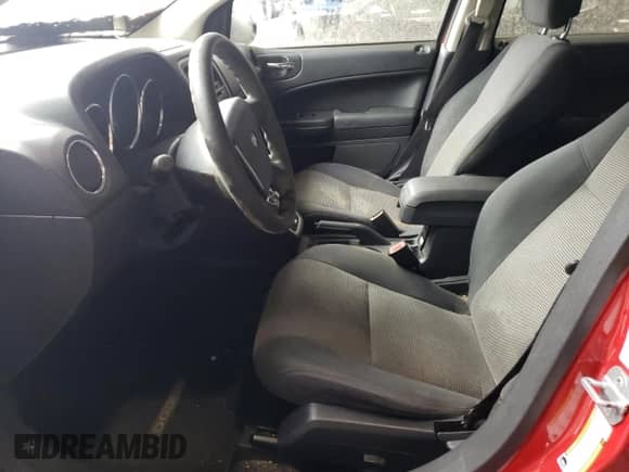 2011 Dodge Caliber Mainstreet with VIN 1B3CB3HA1BD157698, listed as a Copart auction lot 65272774 with 143,803 mi miles and Clean title. Bid and sale history available at DreamBid. Image 7.