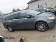 ✅ 2012 Honda Odyssey EX-L • VIN: 5FNRL5H68CB091707 • Lot: 43723624. Listed on IAAI with 184,495 mi. Free auction sales archive from the USA and detailed vehicle history report at DreamBid. Image 13.