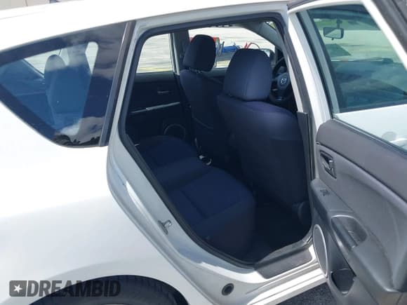 ✅ 2005 Mazda 3 s • VIN: JM1BK143451259508 • Lot: 42732696. Listed on IAAI with 73,642 mi. Free auction sales archive from the USA and detailed vehicle history report at DreamBid. Image 8.