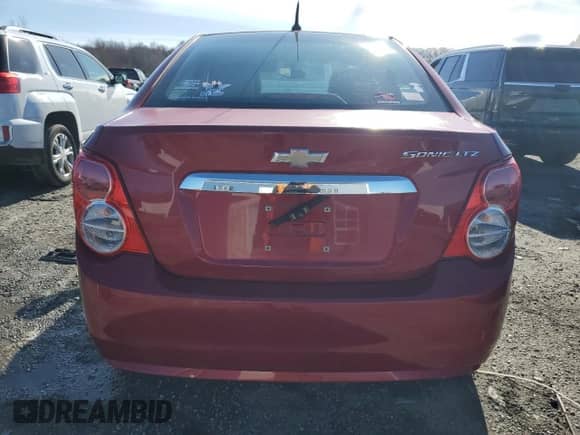 2012 Chevrolet Sonic LTZ with VIN 1G1JE5SHXC4126894, listed as a Copart auction lot 45186475 with 76,461 mi miles and Clean title. Bid and sale history available at DreamBid. Image 6.