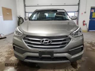 ✅ 2018 Hyundai Santa Fe 2.4L • VIN: 5NMZTDLB0JH082963 • Лот: 70990512. Опубликован ранее на Copart с пробегом 96 185 миль. Бесплатный доступ к архиву аукционных продаж из США и подробный отчёт об истории автомобиля на DreamBid. Изображение 5.