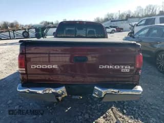 ✅ 2003 Dodge Dakota SLT • VIN: 1D7HL42N23S226033 • Lot: 83297194. Wystawiony na Copart z przebiegiem Nie podano. Bezpłatny archiwum sprzedaży aukcyjnych z USA i szczegółowy raport historii pojazdu na DreamBid. Zdjęcie 6.