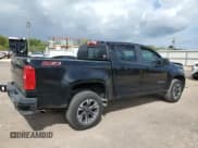 ✅ 2021 Chevrolet Colorado 2WD Z71 • VIN: 1GCGSDEN2M1280928 • Лот: 54603665. Опубликован ранее на Copart с пробегом 26 278 миль. Бесплатный доступ к архиву аукционных продаж из США и подробный отчёт об истории автомобиля на DreamBid. Изображение 3.
