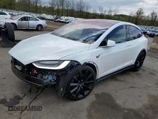 ✅ 2016 Tesla Model X 70D • VIN: 5YJXCBE21GF031958 • Lot: 50015483. Listed on Copart with 116,601 mi. Free auction sales archive from the USA and detailed vehicle history report at DreamBid. Image 1.