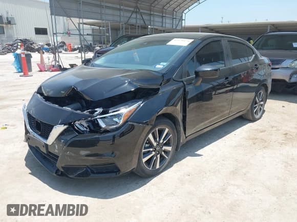 ✅ 2022 Nissan Versa SV • VIN: 3N1CN8EV7NL821479 • Lot: 42470470. Listed on IAAI with 49,880 mi. Free auction sales archive from the USA and detailed vehicle history report at DreamBid. Image 2.