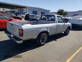 ✅ 1989 Toyota Pickup DLX • VIN: JT4RN82PXK0001791 • Lot: 72990424. Listed on Copart with 168,369 mi. Free auction sales archive from the USA and detailed vehicle history report at DreamBid. Image 3.