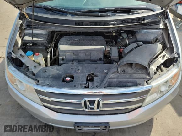 ✅ 2013 Honda Odyssey EX • VIN: 5FNRL5H46DB051383 • Lot: 86451115. Listed on Copart with 177,749 mi. Free auction sales archive from the USA and detailed vehicle history report at DreamBid. Image 12.