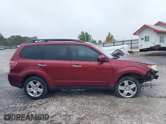 ✅ 2009 Subaru Forester X Limited • VIN: JF2SH646X9H715094 • Лот: 43556897. Опубликован ранее на IAAI с пробегом 233 444 миль. Бесплатный доступ к архиву аукционных продаж из США и подробный отчёт об истории автомобиля на DreamBid. Изображение 14.