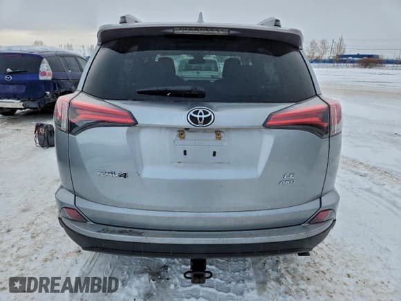 ✅ 2018 Toyota RAV4 LE • VIN: 2T3BFREV4JW802399 • Lot: 94268425. Listed on Copart with 114,198 mi. Free auction sales archive from the USA and detailed vehicle history report at DreamBid. Image 6.