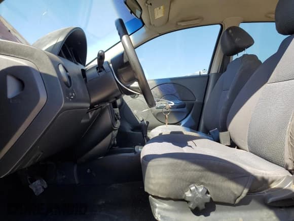 ✅ 2006 Chevrolet Aveo LS • VIN: KL1TD56686B557401 • Lot: 46954465. Wystawiony na Copart z przebiegiem 179 825 mil. Bezpłatny archiwum sprzedaży aukcyjnych z USA i szczegółowy raport historii pojazdu na DreamBid. Zdjęcie 7.