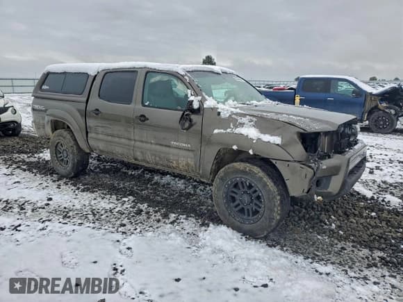✅ 2013 Toyota Tacoma • VIN: 3TMLU4ENXDM113292 • Lot: 93535505. Listed on Copart with 201,918 mi. Free auction sales archive from the USA and detailed vehicle history report at DreamBid. Image 4.