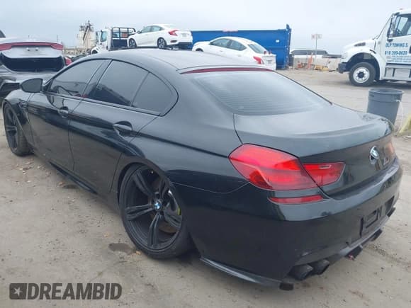 ✅ 2014 BMW M6 • VIN: WBS6C9C57ED467275 • Lot: 42787711. Listed on IAAI with 105,158 mi. Free auction sales archive from the USA and detailed vehicle history report at DreamBid. Image 3.