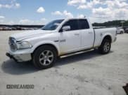 ✅ 2015 Ram 1500 Laramie • VIN: 1C6RR7JMXFS631477 • Lot: 66946105. Listed on Copart with 152,007 mi. Free auction sales archive from the USA and detailed vehicle history report at DreamBid. Image 1.