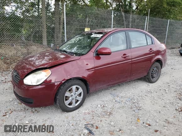 2010 Hyundai Accent GLS z VIN KMHCN4AC6AU396455, wystawiony jako Copart lot #70456214 z przebiegiem 156 018 mil mil oraz Czysty tytuł • Clean title. Historia ofert i sprzedaży dostępna na DreamBid. Obrazek 1.