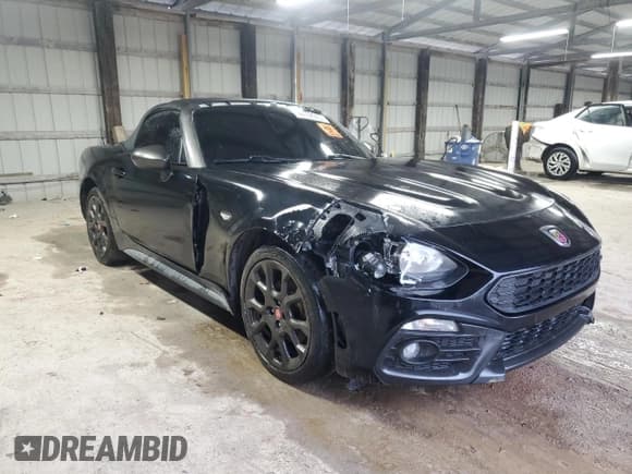 ✅ 2017 FIAT 124 Spider Elaborazione Abarth • VIN: JC1NFAEKXH0124919 • Lot: 90136945. Listed on Copart with 87,257 mi. Free auction sales archive from the USA and detailed vehicle history report at DreamBid. Image 4.