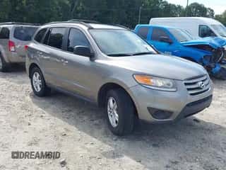 2012 Hyundai Santa Fe GLS z VIN 5XYZG3AB6CG112790, wystawiony jako IAAI lot #43071542 z przebiegiem 260 083 mil mil oraz . Historia ofert i sprzedaży dostępna na DreamBid. Obrazek 1.