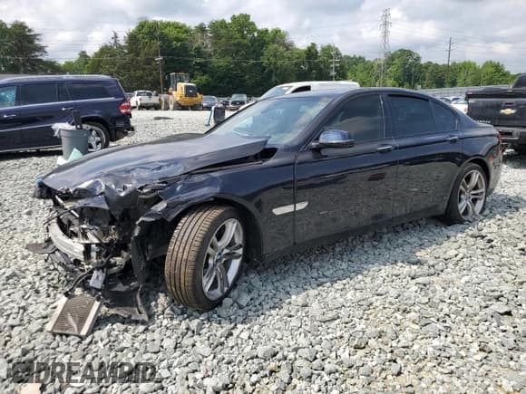 ✅ 2014 BMW 7 Series 740i • VIN: WBAYA6C57ED826660 • Lot: 59566945. Listed on Copart with 95,828 mi. Free auction sales archive from the USA and detailed vehicle history report at DreamBid. Image 1.